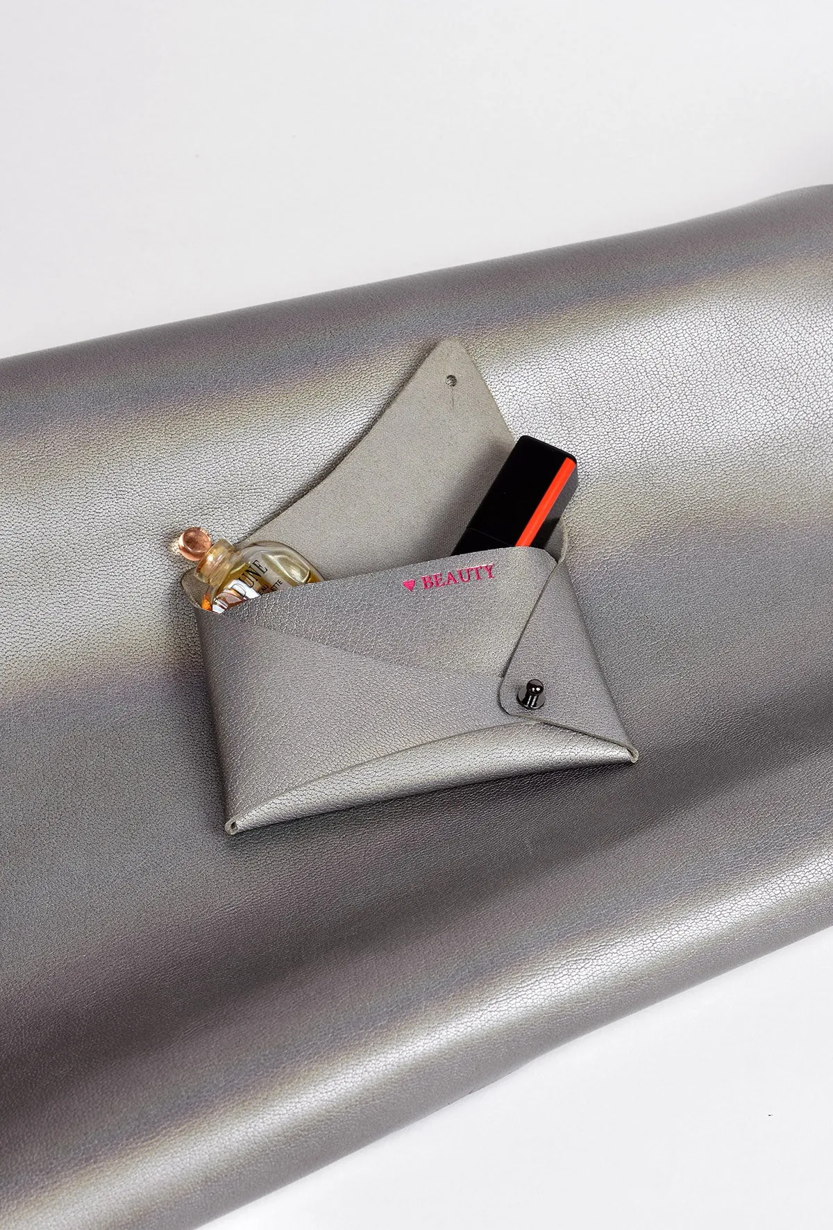 Triangular Slashed Clutch - Size   Colour Options